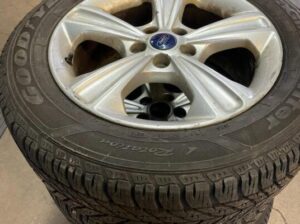 USED 
235/55r17 goodyear snow tires on ford r