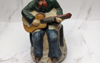 Melody in Motion Cowboy Playing Guitar Music